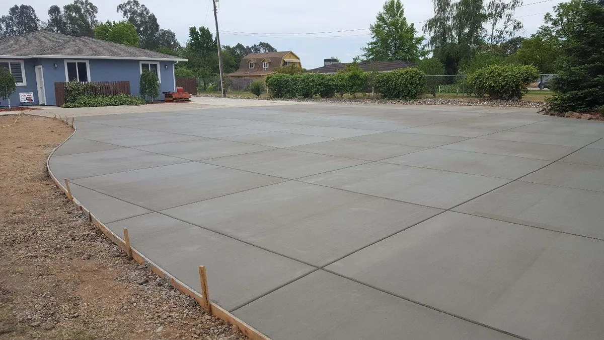 Concrete patio slab installation by Pinnacle Pools and Landscape, Sacramento CA