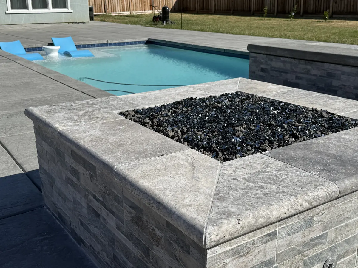 Fire pit glass rock stone veneer by Pinnacle Pools and Landscape, Sacramento CA