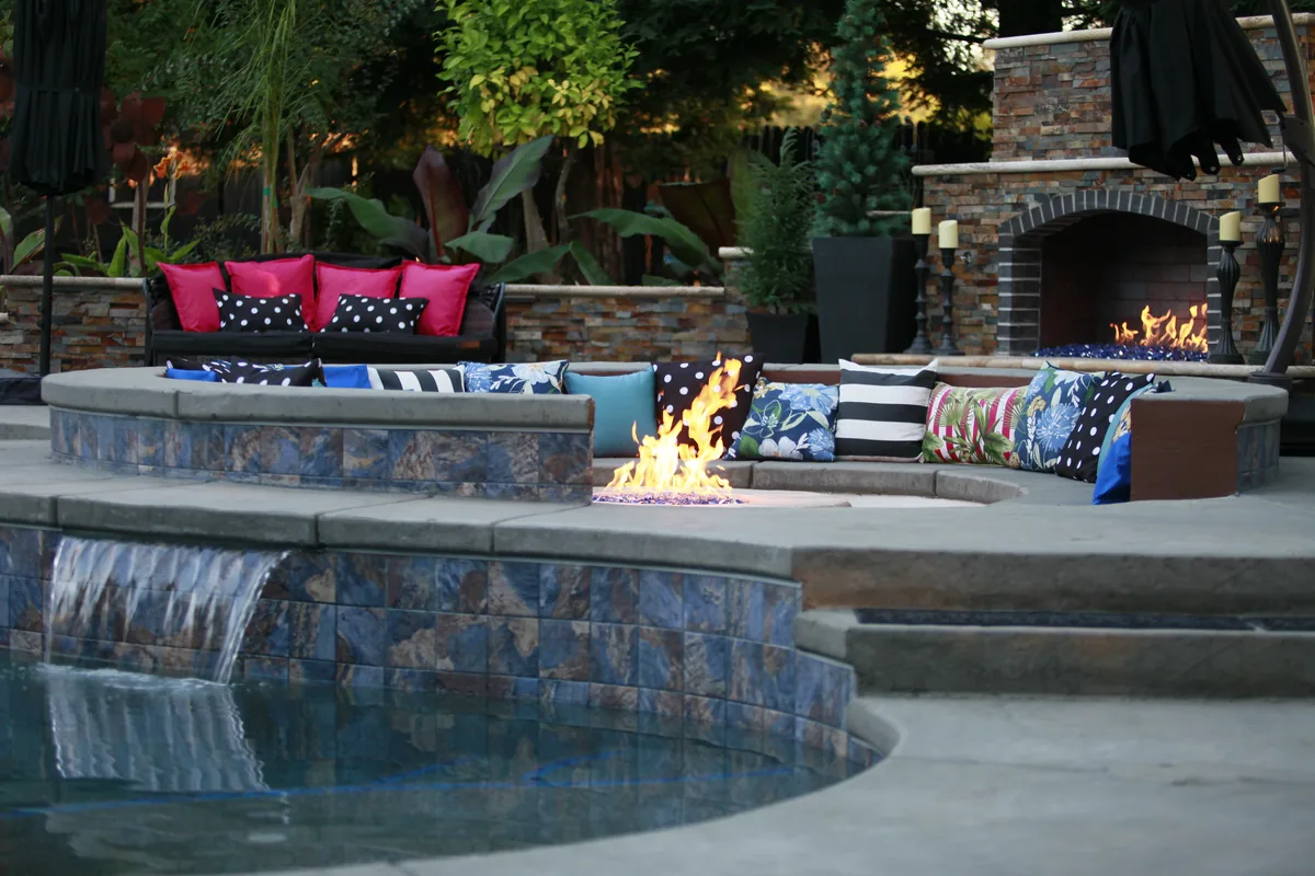 Fire pit lounge seating waterfall spa by Pinnacle Pools and Landscape, Sacramento CA