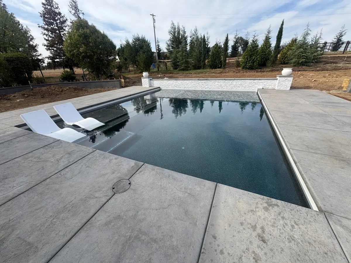 Geometric pool dark finish country view by Pinnacle Pools and Landscape, Sacramento CA