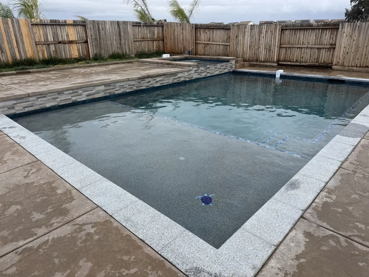 Geometric pool spa water feature deck by Pinnacle Pools and Landscape, Sacramento CA