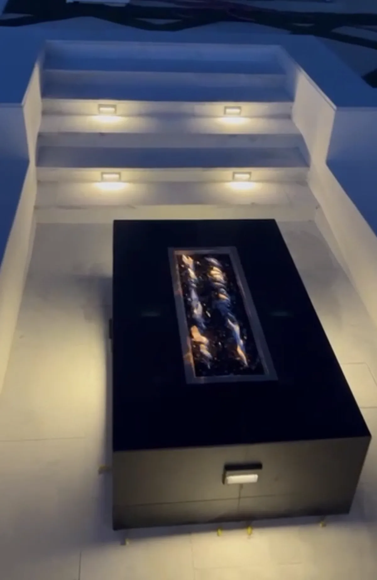 Linear fire pit table night lighting by Pinnacle Pools and Landscape, Sacramento CA
