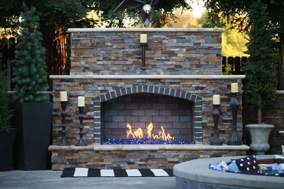 Outdoor fireplace stone veneer patio by Pinnacle Pools and Landscape, Sacramento CA
