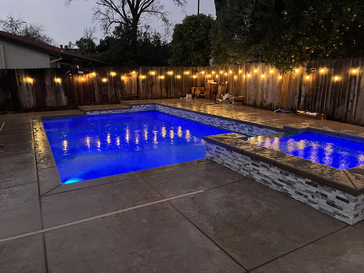 Pool raised wall led lighting string lights by Pinnacle Pools and Landscape, Sacramento CA