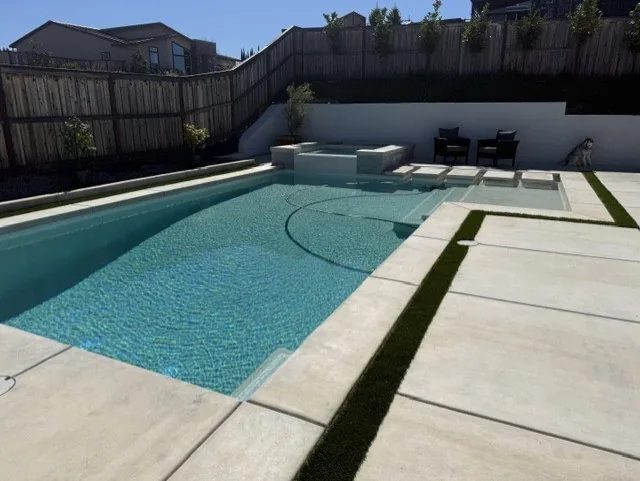 Rectangular pool tanning ledge spa by Pinnacle Pools and Landscape, Sacramento CA