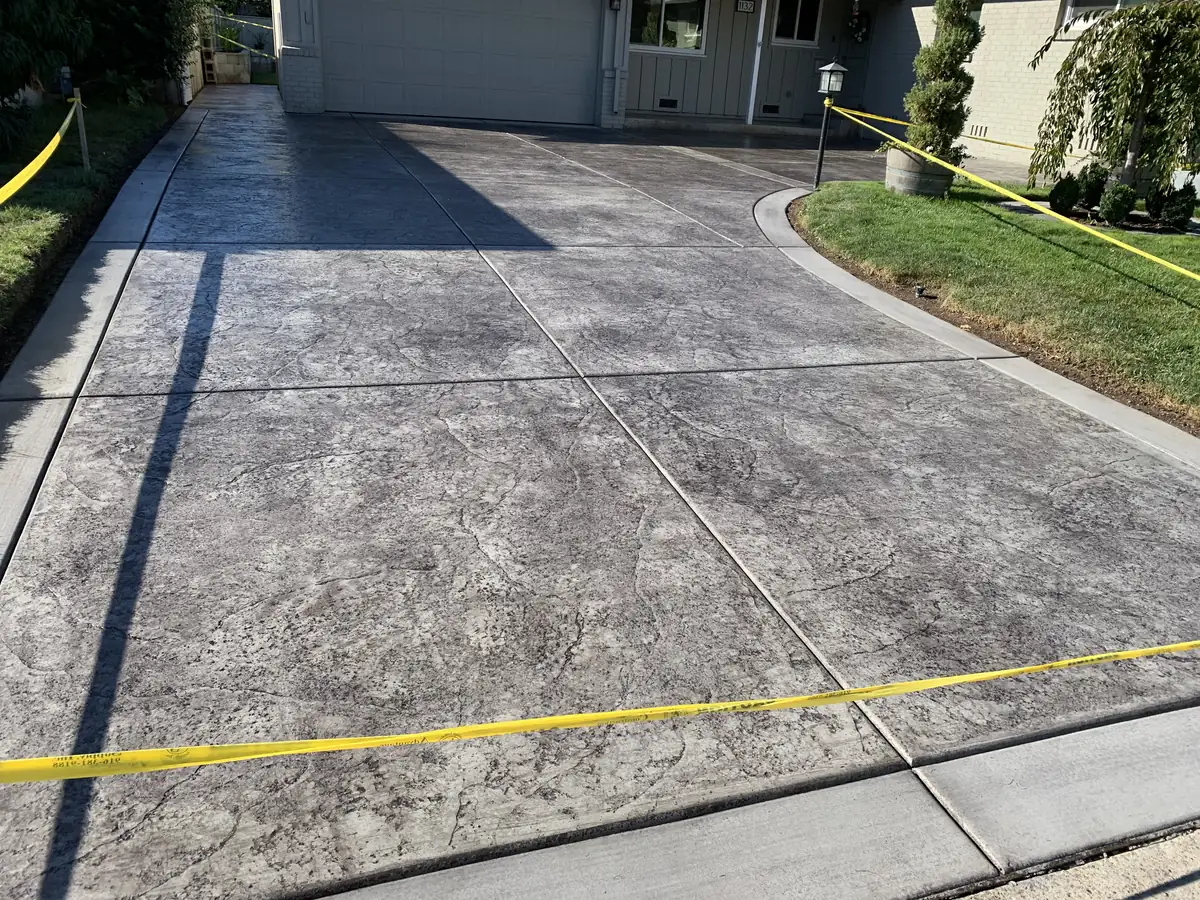 Stamped concrete driveway decorative by Pinnacle Pools and Landscape, Sacramento CA